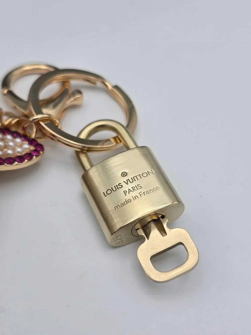 LV Authentic Gold Padlock 🔒 Key Set w/ Unbranded Fox Pom-pom Keychain Charm